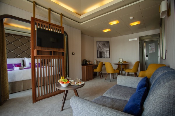 Ambassador Cruise Line AMBIENCE Ambience De Luxe Suite.jpg